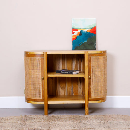 Bring a touch of organic beauty and refined craftsmanship into your home with our Cara Sideboard. Designed to seamlessly blend functionality with timeless aesthetics, this piece is perfect for those who appreciate a mix of natural textures and modern sophistication. The combination of earthy tones and minimalist design makes it a versatile addition to any room. 
Overall dimensions : L99.4cm x D45.7cm x H75.4cm
