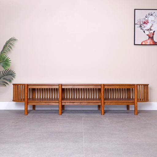Contemporary fusion of style and functionality, made with solid teak wood designed to elevate your home entertainment experience. This TV unit seamlessly combines modern aesthetics with practical storage solutions, creating a centerpiece that enhances both form and function.
Overall dimensions: Widht-240 cm, Depth-65cm, Height-50cm.