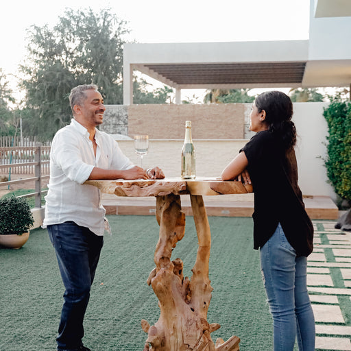 Introducing our Root-Style Solid Wood Outdoor Bar, a unique and organic addition to your outdoor space. Crafted with precision from high-quality solid wood, this bar captures the essence of nature, providing a distinctive and charming setting for your outdoor gatherings.Dimensions - Diameter: 100cmHeight: 110cm