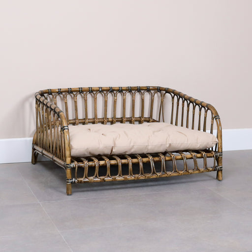 Introducing our Synthetic Rattan Pet Bed, a sanctuary of style and comfort for your furry friend. Crafted with care from high-quality synthetic rattan, this pet house blends seamlessly with your home decor while providing a cozy retreat for your beloved companion. Upgrade your pet's space with a touch of sophistication and undeniable comfort.Dimensions - Height: 46cmWidth: 90cmDepth: 75cm