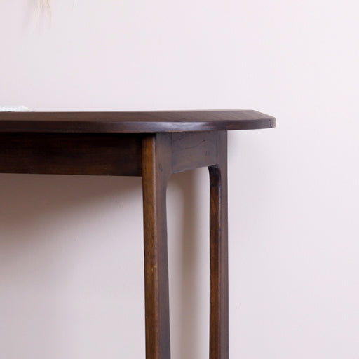 Introducing our Solid Wood Console, a hallmark of enduring beauty and functional design. Meticulously crafted from high-quality solid wood, this console exudes a timeless elegance that effortlessly elevates your home decor. Whether gracing your entryway, living room, or hallway, this piece becomes a versatile canvas for showcasing your style and curating a welcoming ambiance.Dimensions - Height: 75cmWidth: 150cm Depth: 45cm