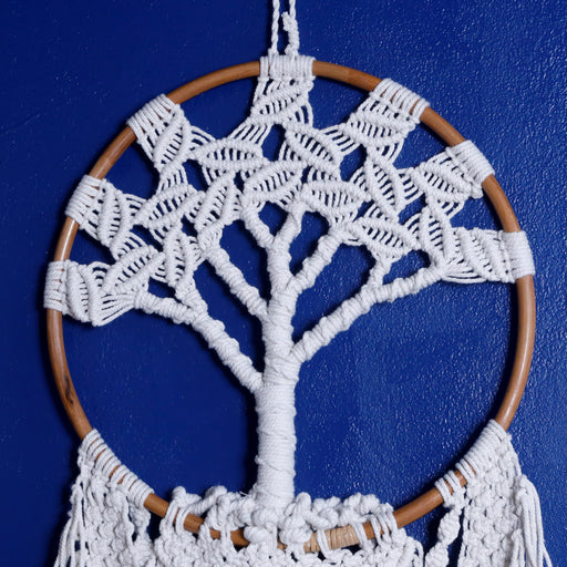Elevate your space with our stunning macramé wall decor. Handcrafted with care, this intricately woven piece adds texture and bohemian charm to any room. Perfect for creating a cozy and stylish atmosphere.