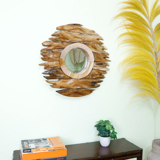 Elevate your wall decor with our Solid Wood Wall Mirror, a stunning blend of functionality and artistic craftsmanship. Each piece is thoughtfully crafted from high-quality solid wood, forming an intricate design that transforms your living space into a gallery of reflective artistry. Adorn your walls with a mirror that not only reflects your image but also becomes a captivating statement piece in your home.Dimensions -Large: Dia 105cmMedium: Dia 95cmSmall: Dia 65cm
