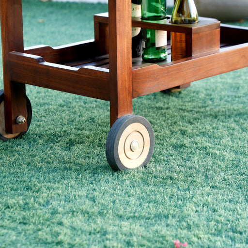 Portable, stylish, and functional Bar Trolley, made of solid teak wood with bottle holders, a removable chopping board, and drawers for cutleries. Its foldable top allows you to take your favorite beverages and snacks on the go with ease. Enjoy convenience and mobility at its best!
Overall dimensions:
length 100cm×width 52cm×height 82cm
