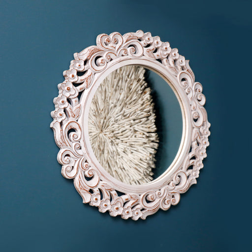 Introducing our Wall Hanging Mirror—a stunning blend of solid wood craftsmanship and vibrant design that transforms your space into a haven of style and serenity. Meticulously crafted from high-quality solid wood and painted in a soothing turquoise hue, this mirror is more than a reflective surface; it's a captivating piece of wall decor that brings a touch of coastal charm and timeless elegance to any room.Dimensions - Diameter: 70cm
