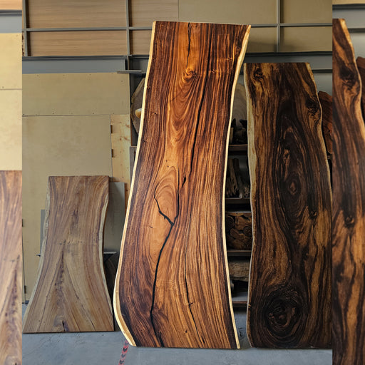 Elevate Your Space with Nature's Masterpiece, where each piece tells a story of timeless beauty and unparalleled craftsmanship. Our live edge slabs showcase the raw, organic beauty of natural wood, complete with its unique grains, knots, and imperfections. Explore our collection today and discover the perfect live edge slab to add warmth, character, and sophistication to your space. 
Note: Normal industrial legs will be provided along with it. For any custom requirement for legs kindly contact the customer support. Thickness ranges from 5cm - 8cm.