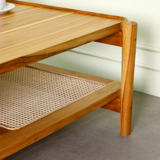Enhance your living space with the perfect blend of rustic charm and modern sophistication. Our Jocosa Coffee Table made with solid teak wood and natural round weave rattan is designed to bring warmth, texture, and timeless beauty to any interior. Whether you prefer a cozy bohemian vibe, a coastal retreat, or a minimalist aesthetic, this handcrafted piece effortlessly complements a variety of styles.
Overall dimensions : Table top Length 110cm x Depth 70cm. Depth including leg : 79cm. Total height 40cm
