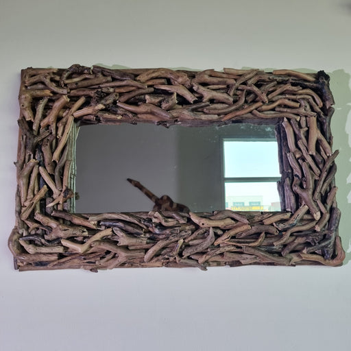 Add an instant touch of style to your decor with this Carved Wooden Mirror. Dimensions: L81cm x H51cm x D6cm