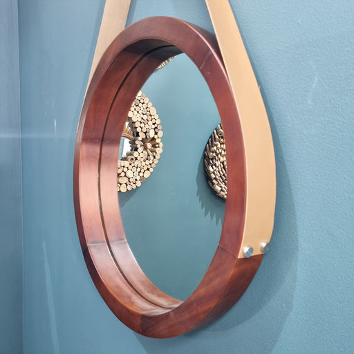 Add an instant touch of style to your decor with this gorgeous wooden hanging mirror.
Made from solid wood - six pieces joined together.Dimensions: Mirror - 60cm diameter. Height of the Hanging to bottom of Mirror -93cm