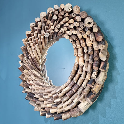 Add an instant touch of style to your decor with this Carved Wooden Mirror.Dimensions: 60cm diameter