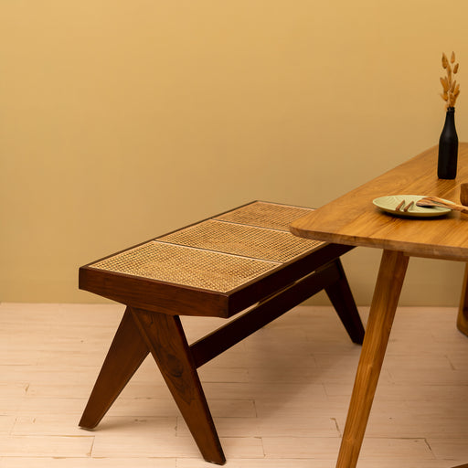 This Rattan Wooden bench is the perfect addition to your indoor or outdoor living space. The Rattan and solid Teak legs add a casual vibe to any room while still allowing it to feel sleek and modern. Material - Teak, RattanAvailable in two sizesDimensions Three-Seater -Seating: 120 cm x 40cm Total height: 45 cm Dimensions Two-seater - Seating: 90cm x 40 cmTotal height: 45 cm