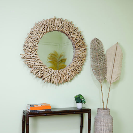 Elevate your wall decor with our Solid Wood Wall Mirror, a stunning blend of functionality and artistic craftsmanship. Each piece is thoughtfully crafted from high-quality solid wood, forming an intricate design that transforms your living space into a gallery of reflective artistry. Adorn your walls with a mirror that not only reflects your image but also becomes a captivating statement piece in your home.Dimensions -Large: Dia 110cmMedium: Dia 85cmSmall: Dia 65cm
