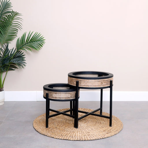 Solid wood table top with black painted metal legs is just what you need to add that touch of sophistication and class to any space. 
Dimensions: Big - Top 50cm Diameter x Total Height 54cm. Small - Top 40cm Diameter x Total Height 41cm.