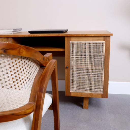 Revitalize your study room or office ambiance with our meticulously crafted Jeanette Rattan Work Desk. Designed to blend elegance with functionality, this desk offers a refined solution for your professional needs.