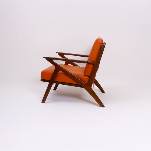 Relax in warmth and comfort with the Amber Lounge Chair. Perfect for living rooms, reading corners, or cozy nooks, this lounge chair combines classic design with plush seating for ultimate relaxation.