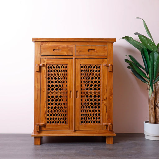 This solid wooden cabinet is stylish and provides plenty of storage space. Perfect for those who love teak wood, but want something different.