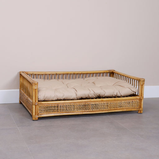 Introducing our Synthetic Rattan PetBed, a sanctuary of style and comfort for your furry friend. Crafted with care from high-quality synthetic rattan, this pet house blends seamlessly with your home decor while providing a cozy retreat for your beloved companion. Upgrade your pet's space with a touch of sophistication and undeniable comfort.Dimensions -Height: 35cm Width: 112cm Depth: 70cm