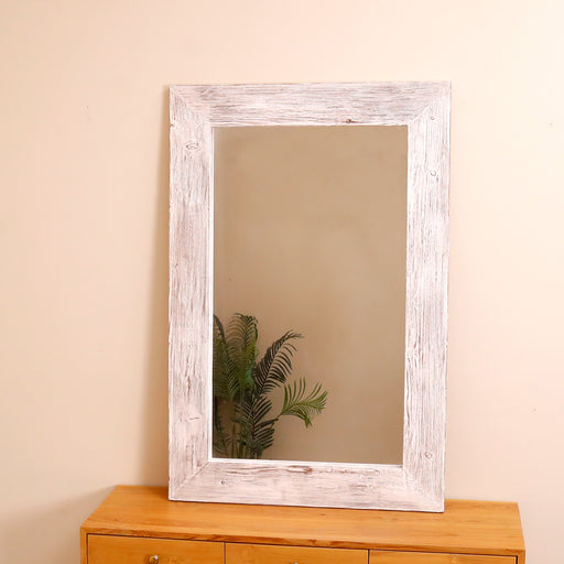 Discover the perfect balance of beauty and function with our Mirage Mirror Meticulously designed, this mirror features a handcrafted wooden frame that combines durability with aesthetic appeal. Whether you're looking to add a rustic charm, vintage feel, or sleek contemporary touch to your room, this floor mirror complements a variety of home decor styles.