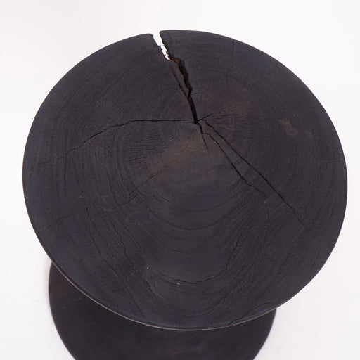 Elevate your décor with the Onyx Side Table, crafted from burned wood for a natural yet refined look. A durable and versatile accent table suitable for a variety of interior styles