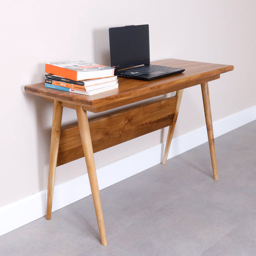 Introducing our Solid Wood Work Desk—a fusion of timeless design and functional elegance crafted to enhance your workspace. Immerse yourself in the beauty of solid wood as you engage in tasks, meetings, or creative pursuits. Elevate your work environment with a desk that seamlessly blends durability, sophistication, and ergonomic design.Dimension - Height: 78cmWidth: 126cmDepth: 49cm