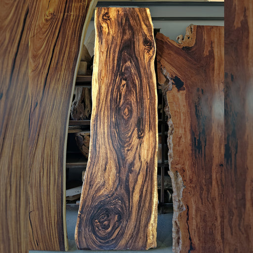 Elevate Your Space with Nature's Masterpiece, where each piece tells a story of timeless beauty and unparalleled craftsmanship. Our live edge slabs showcase the raw, organic beauty of natural wood, complete with its unique grains, knots, and imperfections. Explore our collection today and discover the perfect live edge slab to add warmth, character, and sophistication to your space. 
Note: Normal industrial legs will be provided along with it. For any custom requirement for legs kindly contact the customer support. Thickness ranges from 5cm - 8cm.