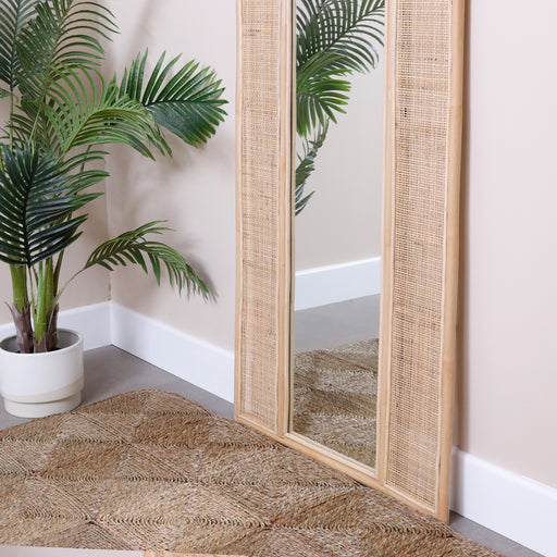 Introducing our Rattan-Styled Floor Mirror, where functional beauty meets bohemian charm. This floor mirror is a stunning statement piece that seamlessly blends the warmth of rattan with the functionality of a full-length mirror. Elevate your space with natural reflections and a touch of boho-chic sophistication.Dimensions - Height: 220cmWidth: 80Cm