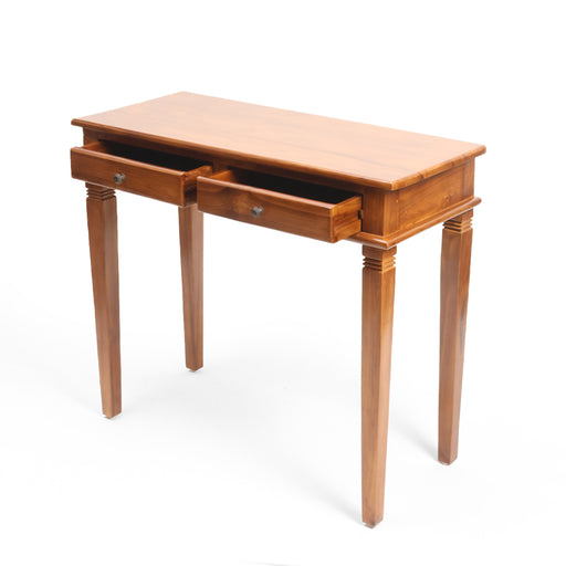 The Vivienne Vanity Table is an elegant anchor for the sophisticated dressing room. Perfectly proportioned for smaller spaces, it features the collection's signature tapered legs with fluted collar detailing. Whether used as a luxury morning station for beauty rituals or a slimline writing desk for a home office, its clean lines and warm timber tones bring an air of quiet luxury to any interior.


Dual-Drawer Storage: Two symmetrical drawers provide organized space for cosmetics, jewelry, or stationery, finished with premium burnished metal pulls.


Architectural Tapered Legs: Hand-crafted legs with a classic fluted design that offer a light, graceful footprint while maintaining absolute stability.


Refined Beveled Top: The tabletop features a subtle beveled edge, a hallmark of boutique craftsmanship that adds visual depth to the piece.


Slimline Profile: A shallow-depth design that makes it a versatile solution for master suites, guest rooms, or even as a foyer console.

