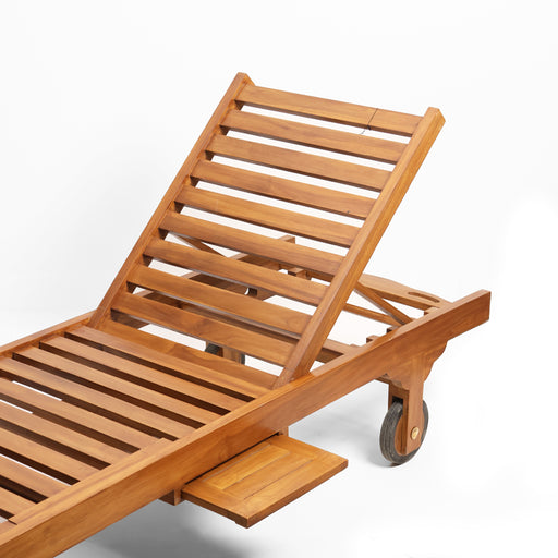 The Beaufort Sun Lounger is an invitation to master the art of relaxation. Inspired by the classic "steamer" chairs of luxury ocean liners, this lounger features a highly adjustable multi-zone frame, including a unique knee-support bend for ergonomic comfort. Hand-finished with smooth slats and integrated wheels for effortless movement, it is the definitive statement piece for premium poolside or terrace living.


Ergonomic Multi-Adjust System: Features an adjustable backrest and a reclining knee section, allowing you to find the perfect physiological position for lounging.

Integrated Drinks Tray: A discreet, slide-out side table provides the perfect spot for cocktails, books, or sunglasses without requiring extra furniture.

Portable Design: Equipped with two rubber-treaded rear wheels and a sturdy front handle for easy repositioning to follow the sun.

All-Weather Slatting: Precision-spaced timber slats allow for maximum airflow and quick drainage, ensuring comfort and longevity in outdoor environments.

Specifications:


Type: Premium Outdoor Sun Lounger

Features: Pull-out side tray, 5-position backrest, adjustable knee support

Design: Boutique Nautical / Coastal Estate Style

Mobility: Integrated rear wheels
