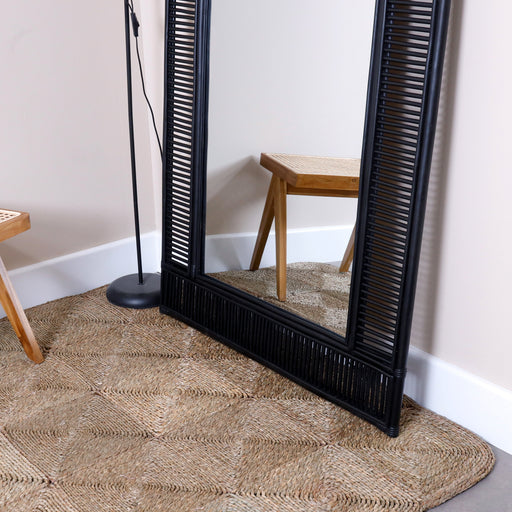 4Transform your living environment with the Accra Floor Mirror. Embodying the "Urban Oak" philosophy where rustic precision meets refined contemporary design, this mirror is far more than just a home accessory—it is a sculptural statement.
Featuring a grand scale and a sleek, modern frame, it anchors your room with light, texture, and a sense of timeless sophistication. In a world of mass-produced plastic decor, the Accra stands out with its genuine handcrafted construction, serving as a premium interior anchor that reflects your unique style and high standards for home decor.
Why You'll Love It


Contemporary Artisan Design: A sleek, minimalist aesthetic designed to transcend mere utility, instantly acting as a captivating focal point that adds high-end, modern elegance to your curated living space.


Grand Full-Length Dimensions: Standing an impressive 200 cm tall and a full meter wide, this oversized architectural tool maximizes natural light, opens up smaller floor plans, and offers a flawless full-body view for dressing.


Premium Heavy-Duty Quality: Meticulously handcrafted with care and precision, prioritizing structural integrity. This substantial, weighted piece ensures excellent structural stability built for a lifetime of display.


Two Sophisticated Finishes: Tailor the mirror perfectly to your specific space. Choose the warm Natural Wood Grain finish for Scandi-chic or Bohemian vibes, or the bold Sleek Black finish for Modern Industrial or Minimalist aesthetics.


Product Specifications



Attribute
Details




Type
Handcrafted Full-Length Floor Leaner Mirror


Style
Modern Contemporary / Elegant / Minimalist


Available Finishes
Natural Wood Grain or Sleek Black


Overall Dimensions
200 cm (Height) × 100 cm (Width) × 2.5 cm (Thickness)


Usage
Ideal for Living Rooms, Master Bedrooms, and Dressing Areas




Note: Because each Accra mirror frame is individually handcrafted, subtle variations in the finish and underlying grain are natural characteristics that add to its unique, artisan soul.

