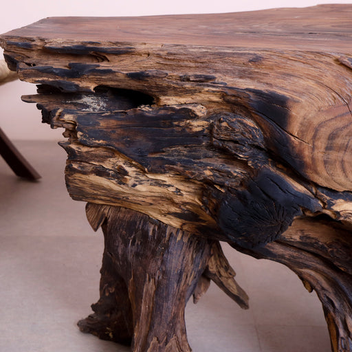 Simple, striking, and built to last, this coffee table is carved from rosewood and is perfect for your living room or entryway.