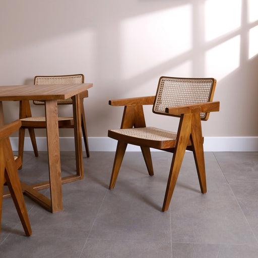 Introduce a harmonious blend of natural luxury and mid-century form into your home sanctuary with the Boston Delight Chair. By beautifully combining the golden warmth of premium solid teak wood with the airy, organic texture of 100% natural hand-woven rattan, it creates an atmosphere of grounded bohemian luxury in any room.
Why You'll Love It


Artisan Hand-Woven Rattan: The seat and backrest are intricately hand-woven from authentic natural rattan strands. This breathable, sustainable material provides flexible support and injects high-end texture into the space.


Legendary Solid Teak Craftsmanship: Meticulously handcrafted from high-grade solid teak wood, guaranteeing lifelong stability, natural oil protection, and a substantial, weighted feel that mass-produced alternatives cannot replicate.


Precise Joinery &amp; Detail: Master craftsmen hand-assemble and finish every single piece, ensuring that each joint is perfectly precise and the natural rattan webbing remains flawlessly taut over time.


Product Specifications



Attribute
Details




Frame Material
100% Premium Solid Teak Hardwood


Seat &amp; Backrest
100% Natural Hand-Woven Rattan Webbing


Style
Mid-Century Modern / Scandinavian / Bohemian Luxury


Finish
Hand-Polished Natural Wood Grain with Intricate Weaving


Dimensions
Width: 55 cm × Depth: 48 cm × Total Height: 76 cm (Seat Height: 45 cm)


Usage
Indoor Dining Rooms, Bohemian Accent Seating, and Home Offices


