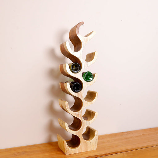 Turn your wine collection into a striking piece of functional wall art with the Eddy Wine Rack. Designed for the enthusiast who appreciates minimalist aesthetics and artisan quality, this rack moves beyond standard storage. By displaying your bottles in a beautiful vertical row, it treats your collection as a design centerpiece that invites conversation and offers easy access.
With its clean lines and hand-finished natural grain, the Eddy rack brings immediate organic warmth, blending seamlessly with modern industrial, Scandi-chic, or classic farmhouse styles.
Why You'll Love It


100% Solid Wood Craftsmanship: Meticulously handcrafted from premium solid timber to provide a heavy-duty, sturdy frame that safely and securely cradles your favorite vintages.

Space-Saving Vertical Layout: The sleek, frees up valuable counter, shelf, and floor space, making it an excellent storage solution for compact kitchens, urban apartments, or home bars.

Two Statement Sizes: Choose between the 80 cm height for tighter spaces or the 100 cm height for a more dramatic vertical display. Pair them together to create an expansive, customized tasting wall.

Artisan Hand-Polished Finish: Every rack is hand-assembled and polished to highlight the unique organic swirls and textures of the natural wood, ensuring it looks premium from every angle.
Product Specifications




Attribute
Details




Material
100% High-Quality Mokey Pod Solid Wood


Size Options
• Small: 80 cm Height• Large: 100 cm Height



Finish
Hand-Polished Natural Grain


Style
Rustic / Modern Minimalist / Industrial








Note: Because each Eddy wine rack is individually handcrafted from genuine solid wood, natural variations in grain patterns and wood tones are to be expected and celebrated.
