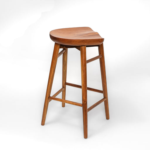 This bar stool is designed for those who value both durability and timeless style. Its minimalist silhouette allows it to blend effortlessly into a variety of decors—from rustic farmhouses to modern industrial lofts. With a focus on comfort and high-quality joinery, it provides a sturdy seat that doesn't overwhelm your space, making it as practical as it is beautiful.


Specifications

Material: High-Quality Solid Wood

Finish: Natural Wood

Seating Dimensions: 45cm × 40cm

Seating Height: 75cm (Ideal for standard bar counters)

Design: Minimalist / Artisanal



Key Features

Exceptional Durability: Crafted from premium solid wood to withstand daily use while maintaining its structural integrity.

Ergonomic Counter Height: Standing at 75cm, it is perfectly proportioned for standard bar-height surfaces and kitchen counters.

Timeless Handcrafted Look: The natural finish celebrates the organic textures of the wood, adding a touch of artisanal warmth to your interior.

Versatile Aesthetic: The clean lines and neutral tones make it an easy match for existing cabinetry and diverse color palettes.
