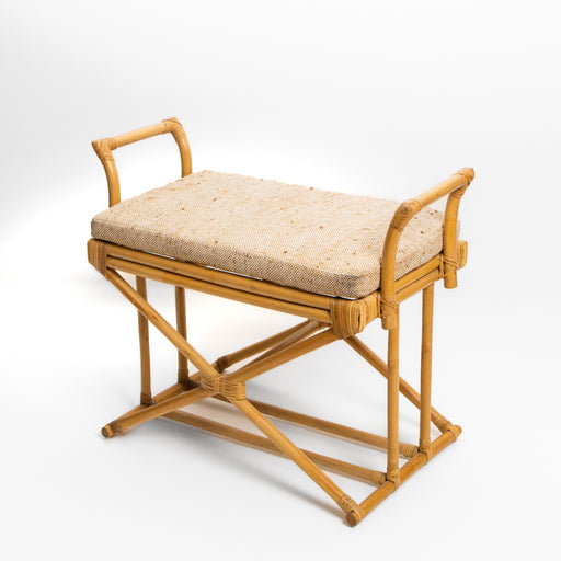 The Brighton Ottoman Bench is a sophisticated blend of natural texture and classic silhouette. Hand-built using durable rattan poles, it features a distinctive X-frame base and elegant curved handles that provide both style and portability. Topped with a soft, textured linen-style cushion, this bench is the perfect addition to a sunny entryway, the foot of a bed, or as an accent seat in a boutique-style lounge.


Sustainable Rattan Frame: Expertly bound rattan poles offer a lightweight yet incredibly sturdy structure.

Classic X-Frame Design: An architectural base that provides timeless appeal and superior stability.

Premium Comfort: Includes a plush, neutral-toned cushion designed to complement any interior color palette.

Curated Detail: Hand-wrapped rattan joints showcase a high level of traditional craftsmanship.

Specifications:


Length: 76cm (Handle to Handle) | 67cm (Seat)

Height: 63cm

Depth: 40cm
