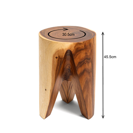 The Avon Side Table is a bold celebration of raw nature meeting refined craftsmanship. Hand-carved from a single solid timber block, it features a unique tripod base with sharp, architectural cutouts that create a sense of lightness and height. The polished top showcases the mesmerizing concentric rings of the tree's history, making it a perfect accent piece for bedside use or alongside a statement lounge chair.


Single-Block Craftsmanship: Carved from a solid piece of timber for unmatched durability and a heavy, premium feel.

Dramatic Silhouette: The tripod "arrow" base offers a modern, sculptural twist on the traditional log stool.

Natural Grain Mastery: High-contrast wood tones and visible growth rings ensure that every piece is a unique work of art.

Versatile Utility: Ideal as a side table, a minimalist nightstand, or a decorative pedestal for plants and sculptures.

Specifications:


Height: 45.5cm

Diameter: 30.5cm
