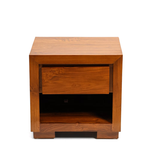 The Zarek Bedside Table is a celebration of architectural form and raw natural beauty. Defined by its thick, structured frame and seamless joinery, this piece showcases the rich, swirling grains of premium solid teak. Its "block" aesthetic provides a grounded, luxurious feel that elevates any modern bedroom suite.


Premium Teak: Hand-finished solid timber, known for its incredible durability and warm honey tones.

Integrated Storage: Features a spacious soft-close drawer and a lower open gallery for effortless organization.

Minimalist Profile: A clean, handle-free look that emphasizes the wood’s natural character.

Built to Last: A heavy-set design that offers both stability and a timeless mid-century modern appeal.

Specifications:

Dimensions: 50cm (H) x 50cm (W) x 35cm (D)
Material: 100% Solid Teak Wood
