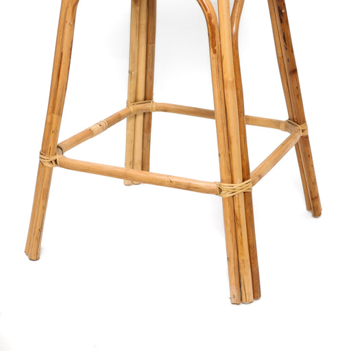 Inspired by relaxed tropical living, the Bali Cane Bar Stool blends natural craftsmanship with everyday comfort. Handcrafted from durable natural cane, this stool features a sturdy yet lightweight frame with beautifully curved detailing. The generously cushioned seat adds comfort, making it ideal for kitchen counters, breakfast bars, cafés, or casual dining spaces.
With its warm tone and organic texture, this stool effortlessly complements bohemian, coastal, and modern-natural interiors. Designed for both residential and commercial use, it offers stability, comfort, and timeless style.Dimensions:Seat Width: 38 cmBase Width: 55 cmHeight: 75 cm