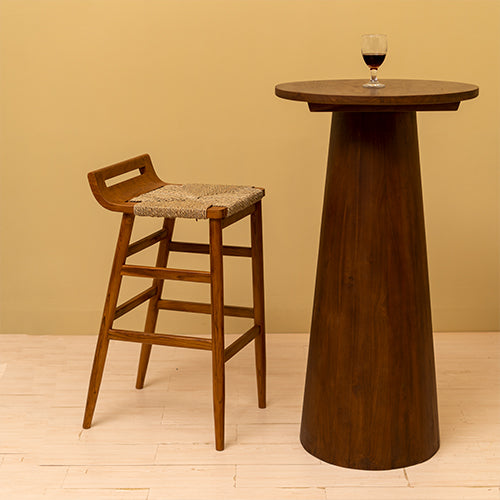 
This bar table is a great spot to place a bowl of snacks, flowers and drinks. The wood material gives it a natural and organic look that goes well with any decor.Dimensions: Top - 60cm diameter x Total H112cm 