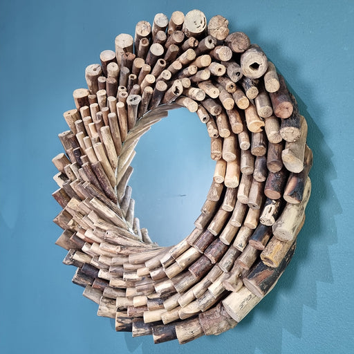 
Add an instant touch of style to your decor with this Carved Wooden Mirror.Dimensions: 60cm diameter