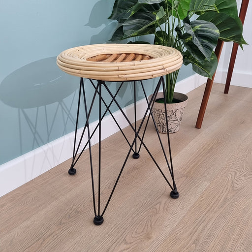 This Rattan Industrial Stool is the perfect addition to your indoor or outdoor living space. The natural fibre adds a casual vibe to any room while still allowing it to feel sleek and modern.Size : Diameter 35cm x Height 45cm. Frame: Rattan Sibaliu + Jawit Lamination. Base Frame: Iron Powder Coating Black.Looking for a different finish? Reach out to us!